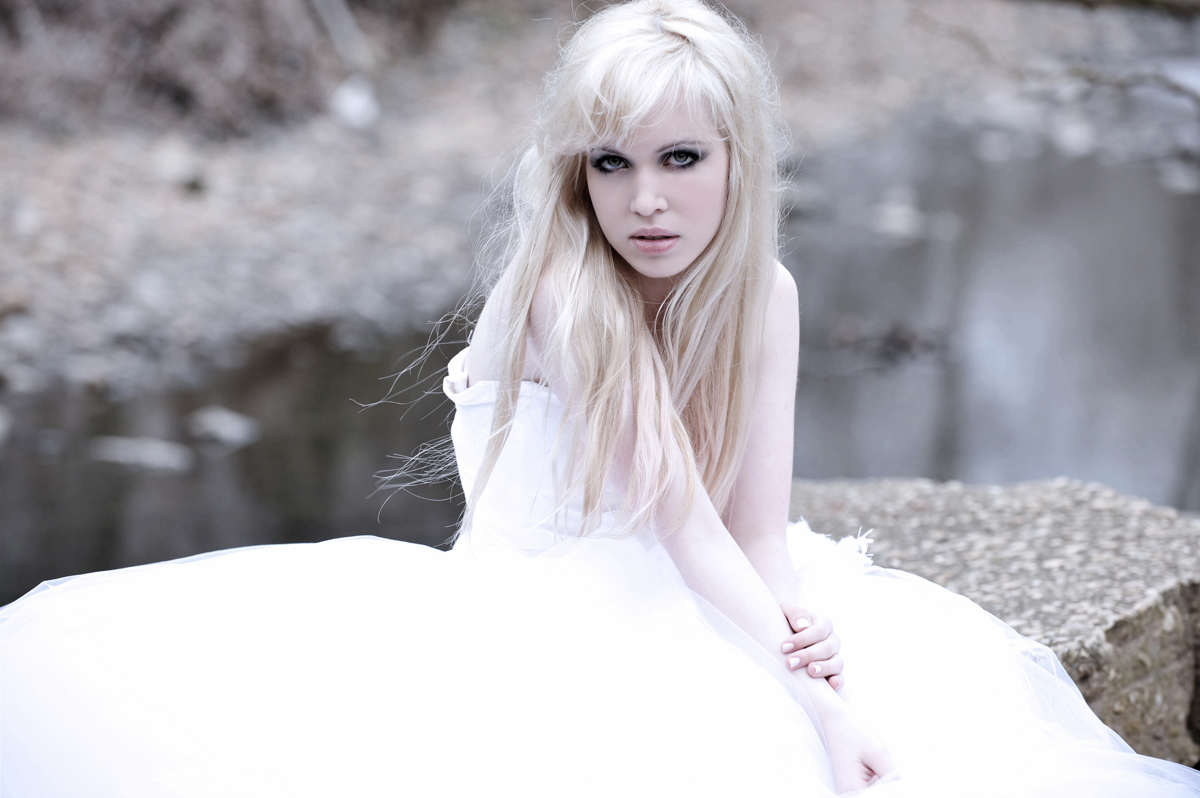 Elizabeth St John bridal gown photographed against stone architecture